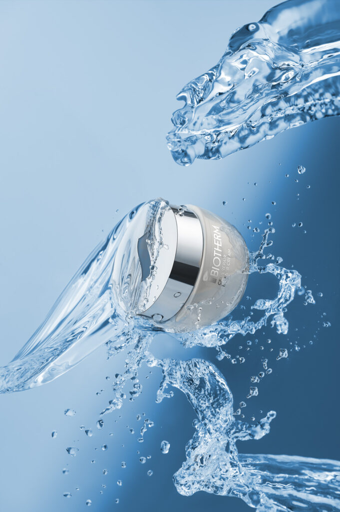 Water shot with cosmetics product in styling by I.Kolodziejska